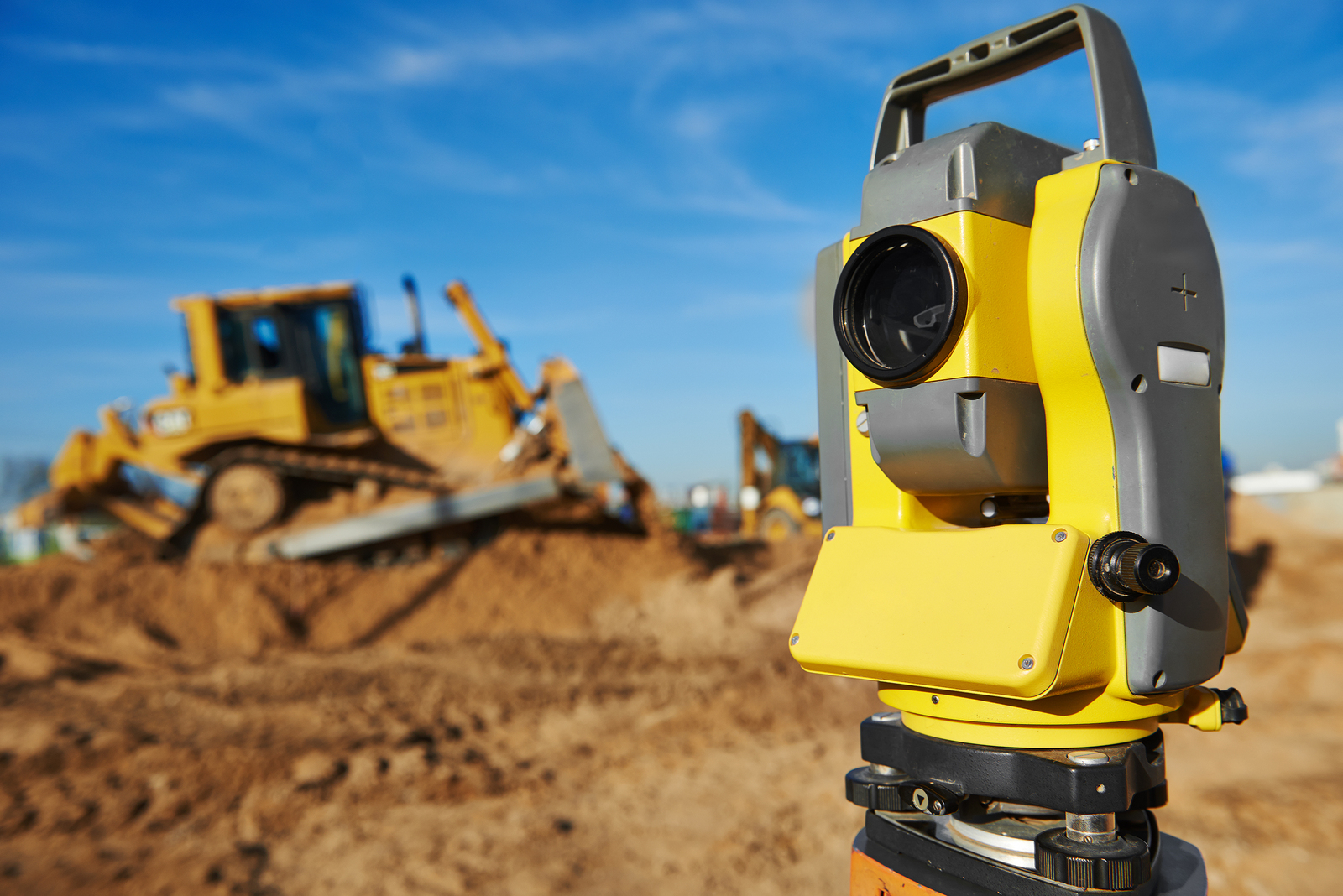 Surveyor equipment tacheometer or theodolite outdoors at construction site